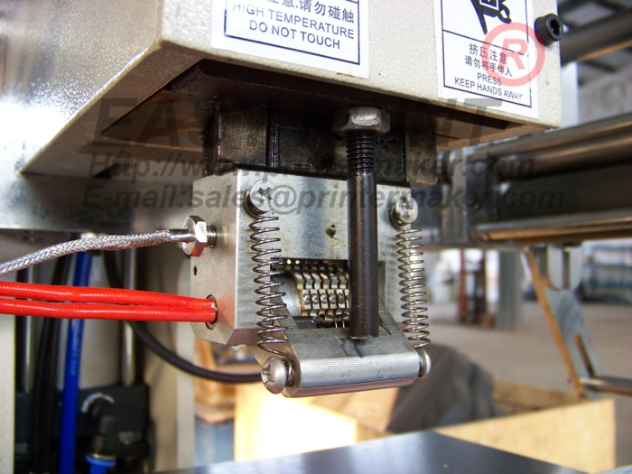 Number Code hot stamping machine on plastic sealing product